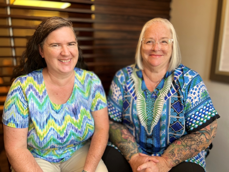 Becky McCray and Deb Brown wearing colorful shirts 