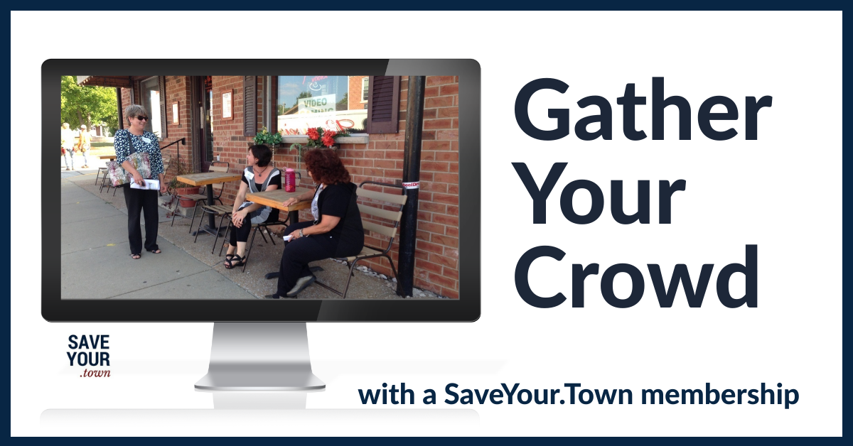 Three people gather at sidewalk tables
